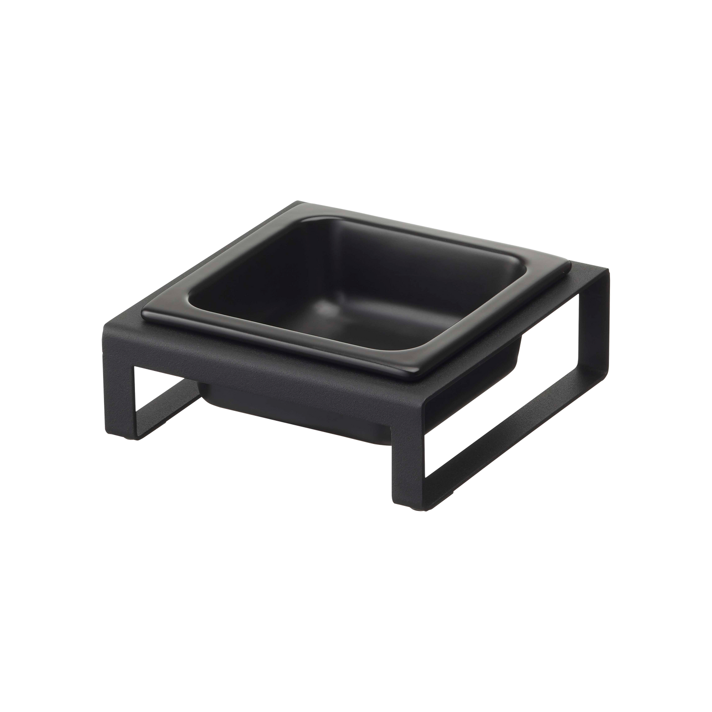 Introducing the Yamazaki Home Single Pet Food Bowl, available in two styles: steel or ceramic. This modern black square bowl sits on a minimalist open-sided frame, featuring sleek non-scratch silicone protectors. Ideal for keeping surfaces pristine while serving or holding small items with style.