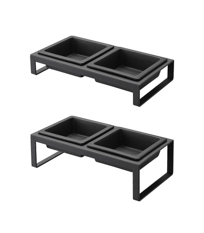 Two-tier black serving stand with rectangular Yamazaki Home ceramic bowls on a white background.