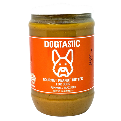 A 16 oz (453 g) jar of SodaPup's Dogtastic Gourmet Peanut Butter for Dogs - Pumpkin Flavor, featuring a red label and crafted from all-natural ingredients like pumpkin and flax seed, offers a natural treat for dogs.