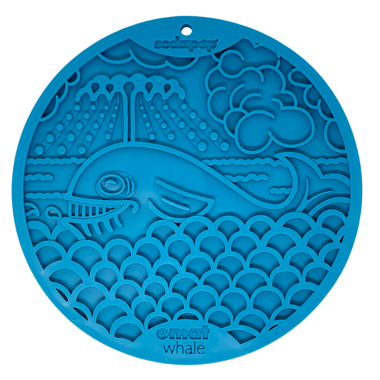 The SodaPup Whale Design EMat Enrichment Lick Mat With Suction Cups is a round blue silicone mat with a raised smiling whale, waves, clouds, and raindrops—ideal as a bath time distraction and embossed with "emaat whale" at the bottom.