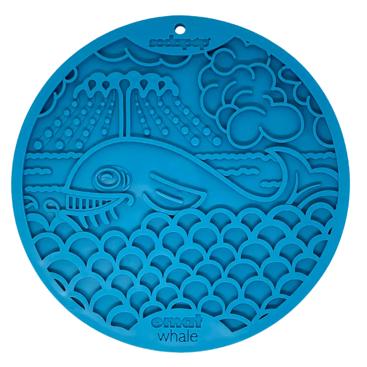 The SodaPup Whale Design EMat Enrichment Lick Mat With Suction Cups is a round blue silicone dog mat with a raised whale, waves, clouds, and sun design. "ematt whale" is embossed on the bottom. Perfect for bath time or enrichment.