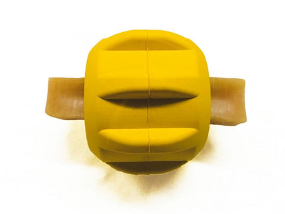 A Gear EDispener Durable Rubber Treat Holder and Chew Toy by SodaPup, featuring a yellow plastic design with a round shape and two brown handles resembling simplified fish fins, includes dental ridges for added benefit, all set against a plain white background.