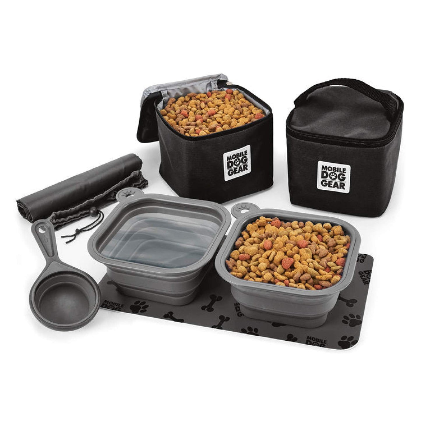 A Mobile Dog Gear Dine Away® Food Set, Large, Black including two collapsible bowls, a scooper, several food carriers, and a mat, all with "Mobile Dog Gear" branding, displayed on a white background.