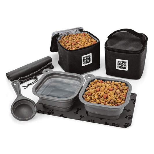 A Mobile Dog Gear Dine Away® Food Set, Large, Black including two collapsible bowls, a scooper, several food carriers, and a mat, all with "Mobile Dog Gear" branding, displayed on a white background.