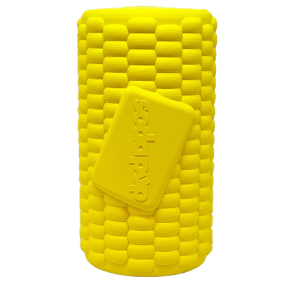 The SodaPup Corn on the Cob EDispenser is a durable, bright yellow dog chew toy and treat dispenser with a bumpy, kernel-like surface and "sodapop" embossed on its attached rectangular piece.