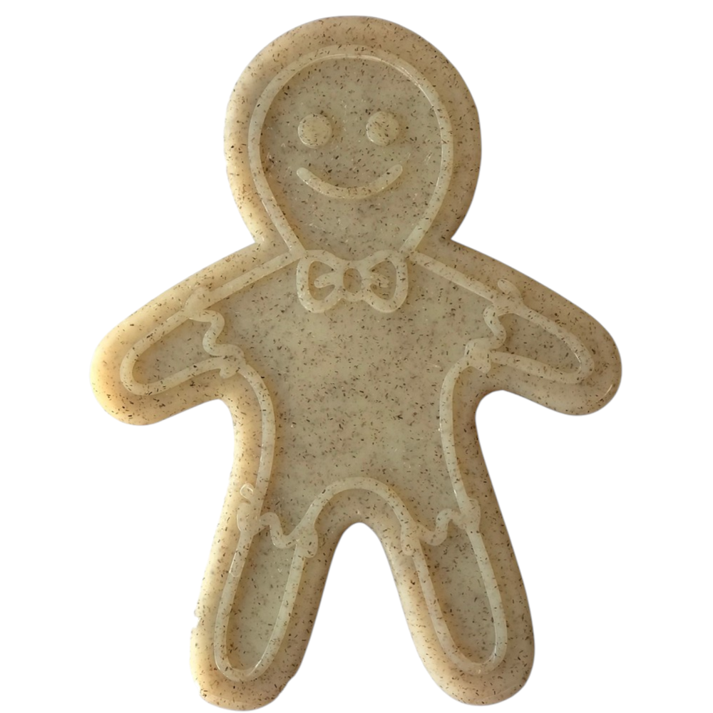 The SodaPup Gingerbread Man Ultra Durable Nylon Dog Chew Toy features a beige, smiling gingerbread man design with a bow tie and decorative lines—ideal for dog lovers and power chewers seeking a whimsical touch.