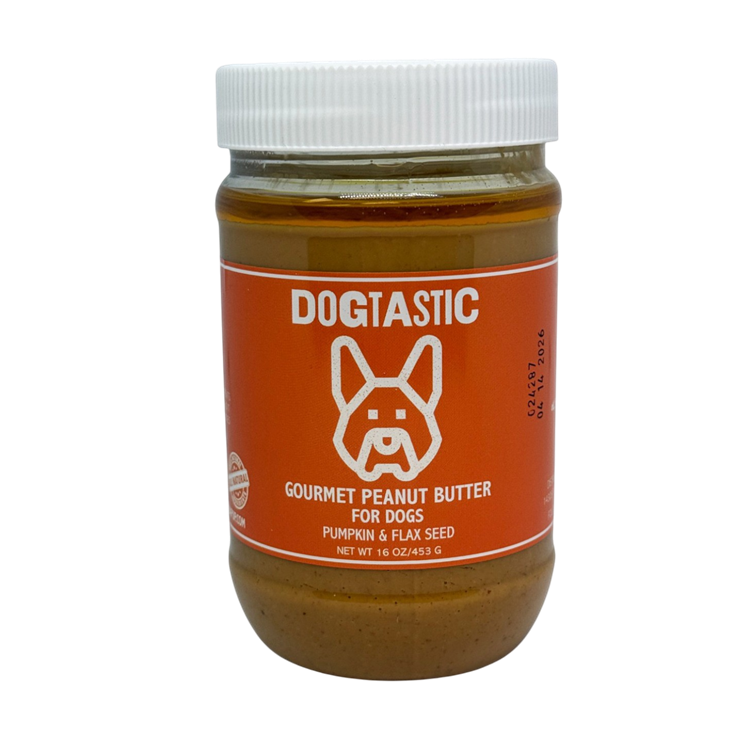 SodaPup Dogtastic Gourmet Peanut Butter for Dogs – Pumpkin & Flax Seed Flavor comes in a jar with an orange label, features a white cartoon dog face, and is made in the USA with all natural ingredients.