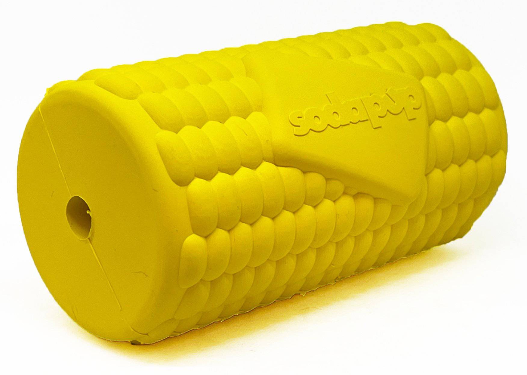 The Corn on the Cob EDispenser is a durable rubber treat dispenser for dogs, featuring a yellow corn cob shape with textured kernels and the SodaPup brand name embossed on the side.