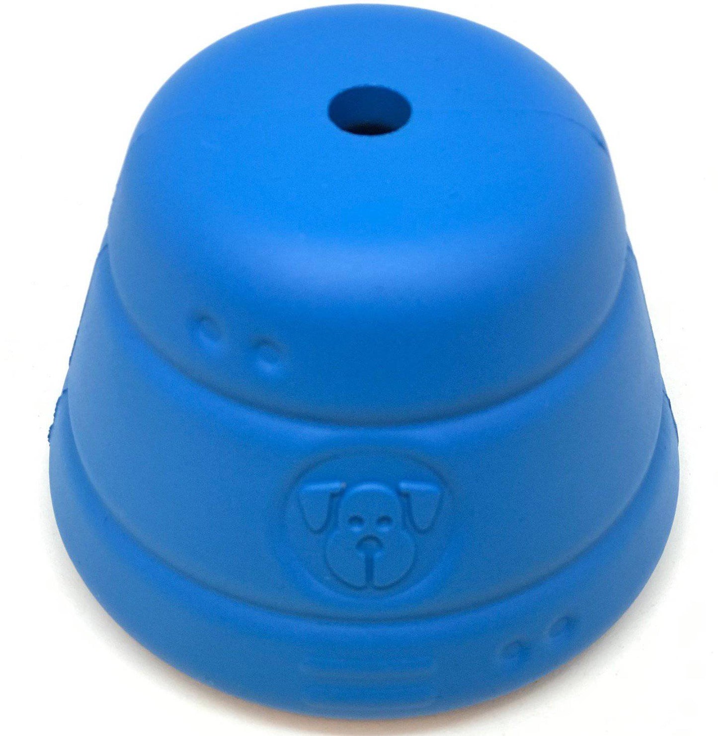 A durable blue Space Capsule Durable Rubber Chew Toy & Treat Dispenser with a hole in the middle that dispenses treats from SodaPup.