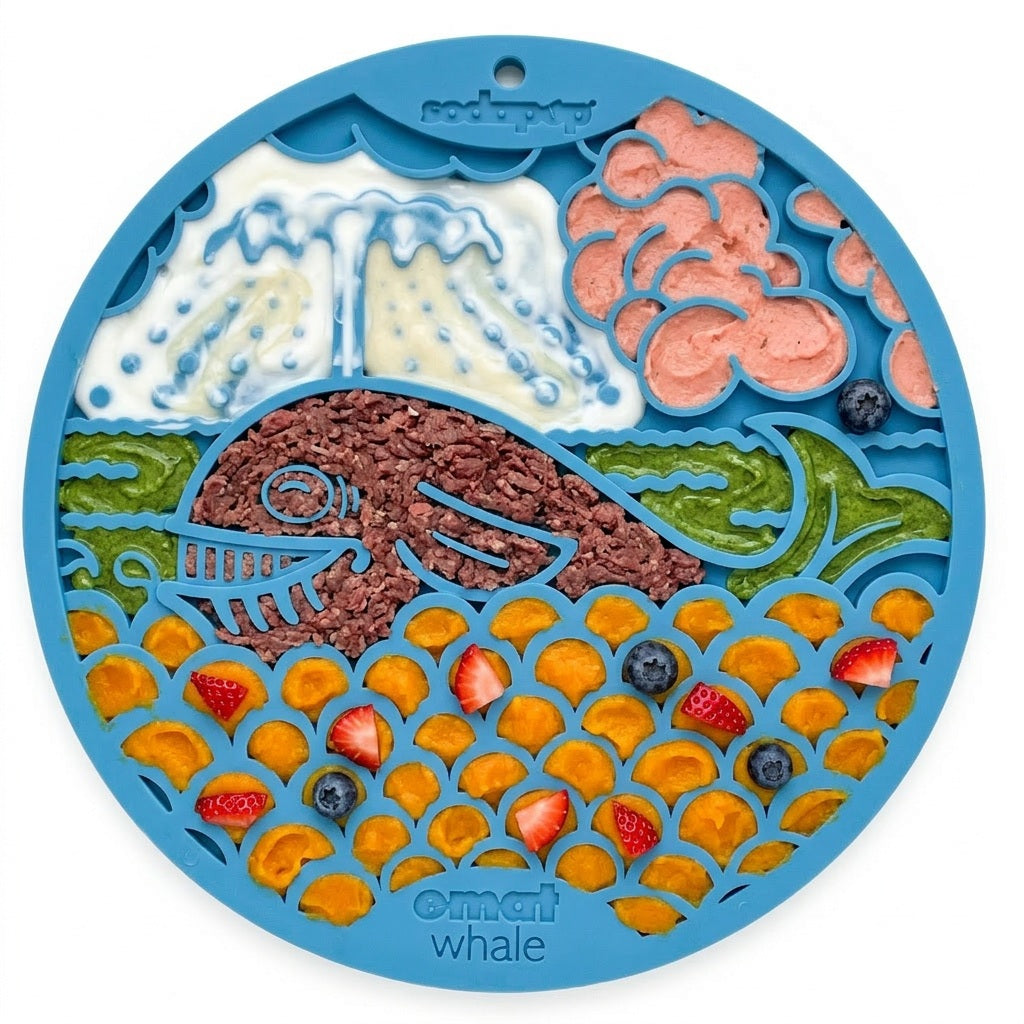 The SodaPup Whale Design EMat Enrichment Lick Mat With Suction Cups features ocean-themed sections, perfect for spreads or treats, turning mealtime or bath time into playful enrichment for your dog.