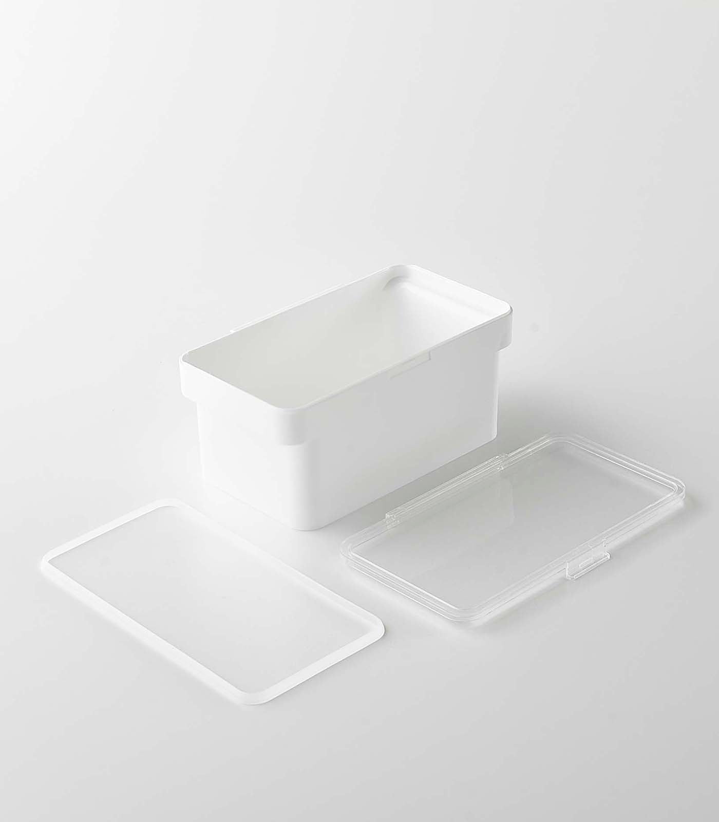 A Yamazaki Home Airtight Pet Food Container - Three Sizes with a lid and a scoop.