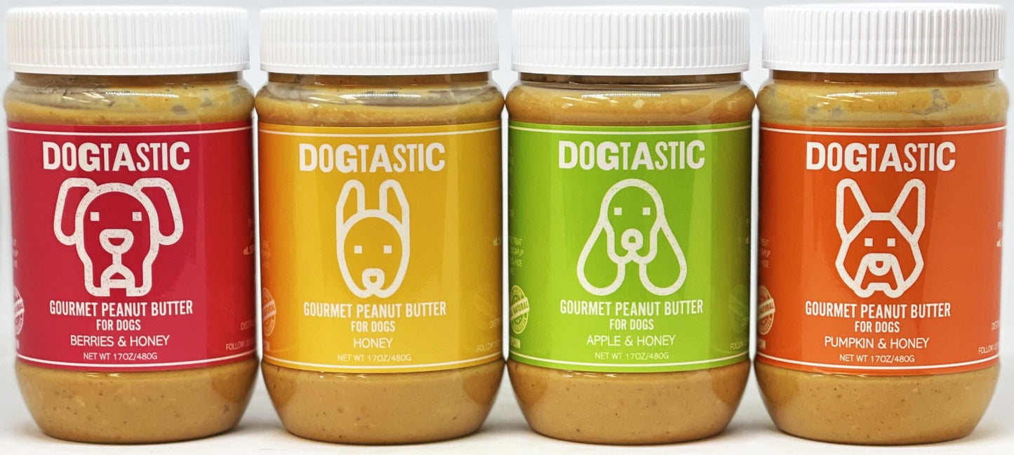 Four jars of Dogtastic Gourmet Peanut Butter for Dogs - Pumpkin & Honey Flavor by SodaPup on a white background.