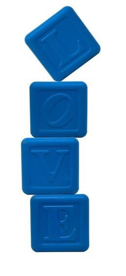 The Love Cube EDispenser by SodaPup features four vertically stacked blue blocks, each adorned with an uppercase letter from the word "LOVE," ingeniously designed as a durable rubber chew toy and treat dispenser to delight your pet with rewards.