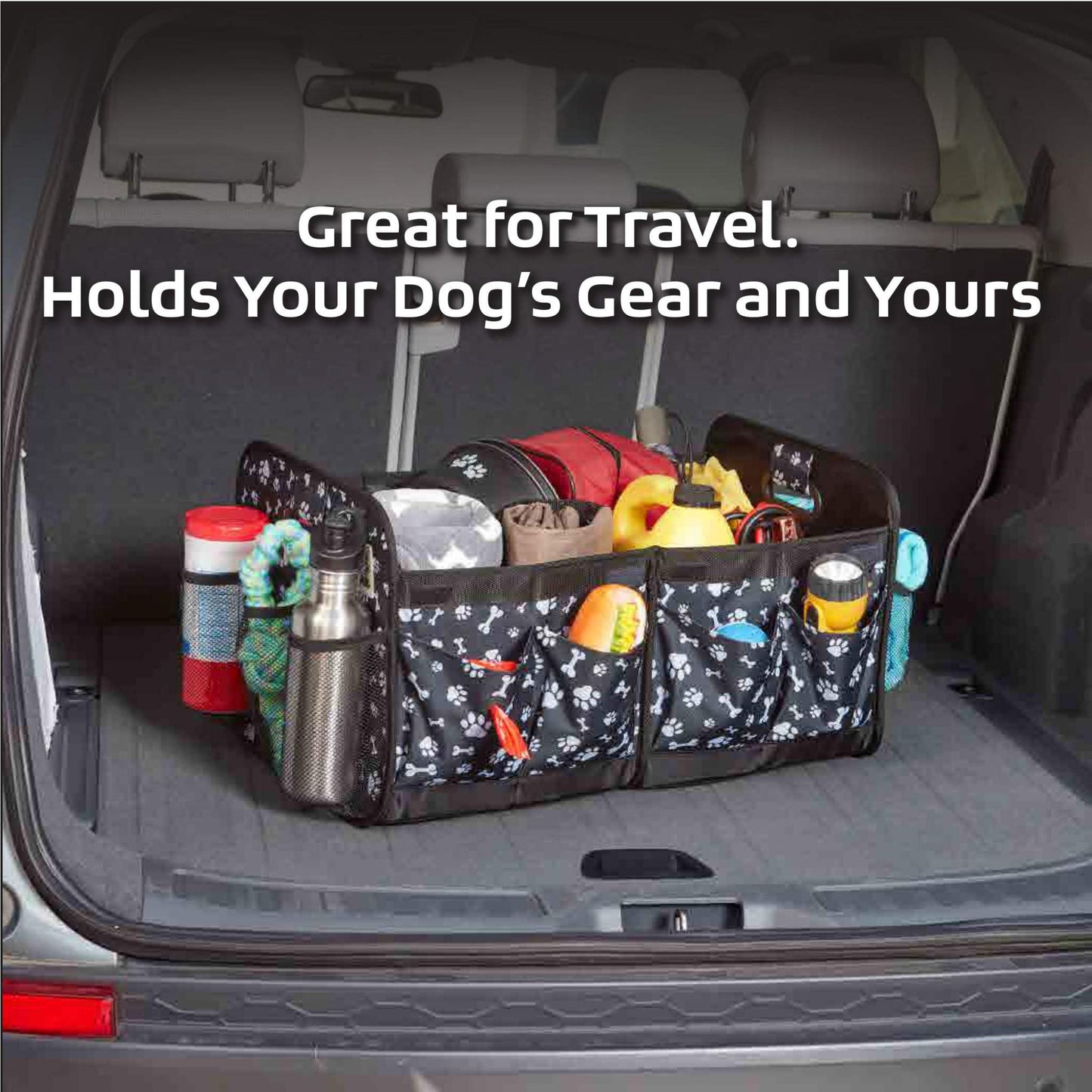 A versatile Mobile Dog Gear Dogssentials Collapsible Storage Organizer with multiple compartments is placed in the back of a vehicle. It holds various items including a water bottle, a thermos, a leash, and other travel essentials. Text above reads, "Great for Travel. Holds Your Dog’s Gear and Yours," with a built-in waste bag dispenser for added convenience.