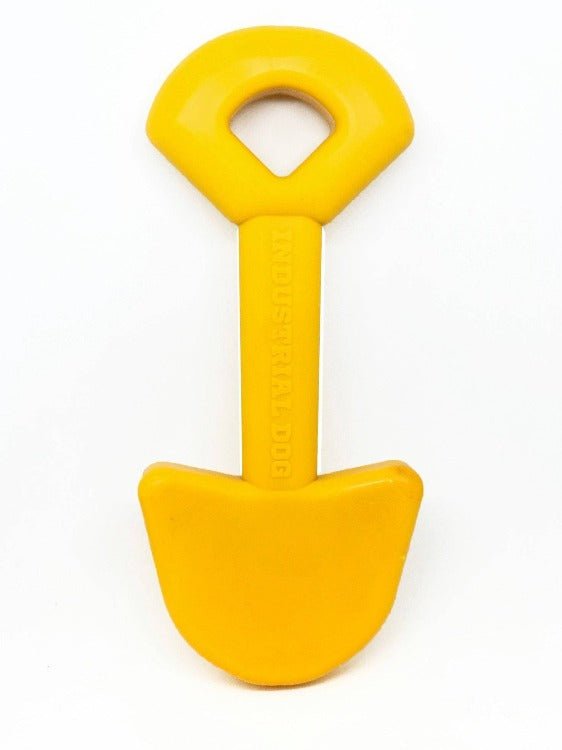 A SodaPup ID Shovel Ultra Durable Nylon Dog Chew Toy with a yellow handle on a white background.