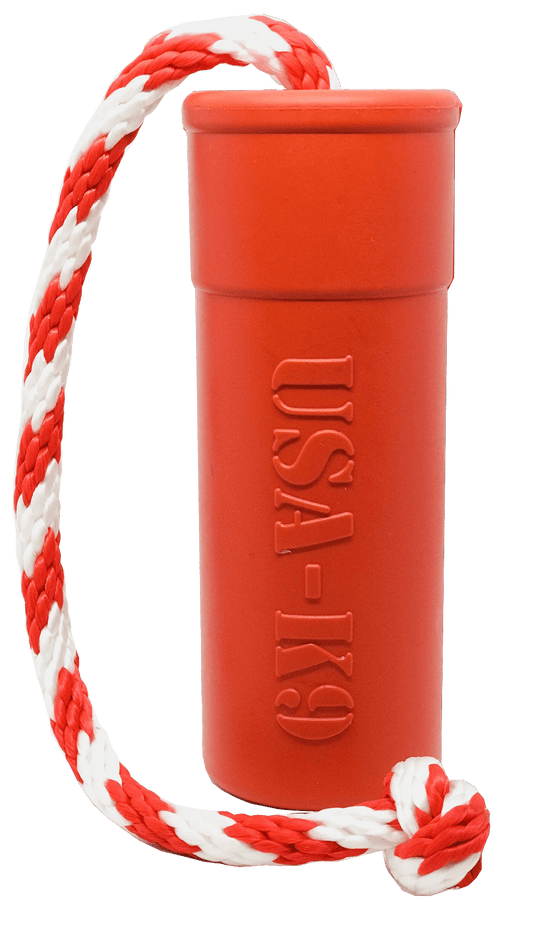 A durable USA-K9 Firecracker Durable Rubber Floating Training Dummy - Large - Red bucket with a rope attached to it, made by SodaPup.