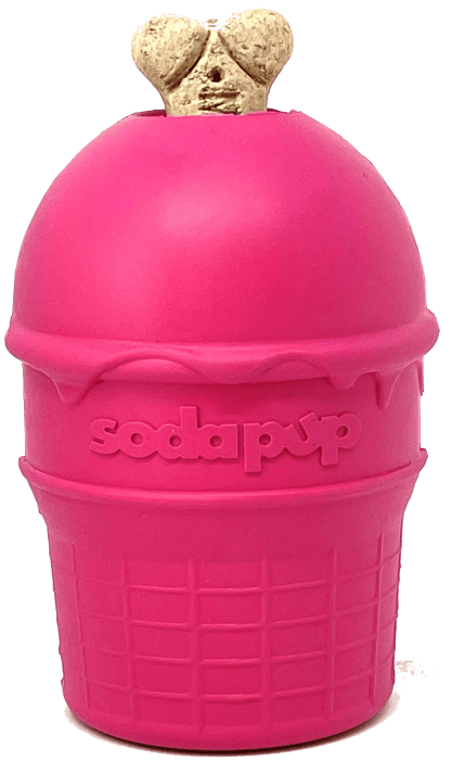 A durable pink SodaPup ice cream cone with a dog in it, serving as a chew toy and treat dispenser.