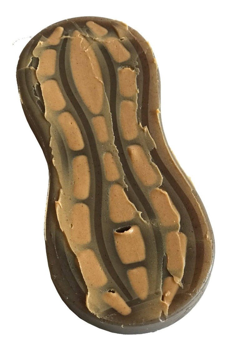 A soap with swirling brown and tan hues, designed to mimic the look of a peanut shell with a resemblance to a peanut inside, much like the robustness of SodaPup's Peanut EChew Ultra Durable Nylon Dog Chew Toy.